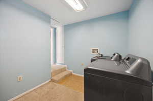 Laundry room featuring washer and dryer hookups