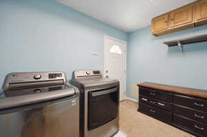 Laundry room featuring washer and dryer hookups