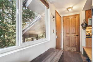 Interior space featuring vaulted ceiling