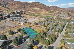 Birds eye view of property with a mountain view