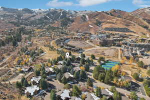 Birds eye view of property with a mountain view