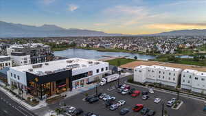 Aerial view at dusk with a water and mountain view