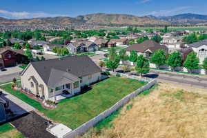 Drone / aerial view with a residential view and a mountain view