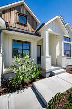 Exterior space featuring board and batten siding and a porch