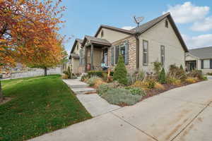 View of front of house with a front yard