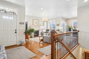 Foyer featuring hardwood / wood-style floors and a textured ceiling