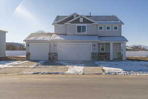 View of front facade with a garage