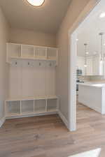 Mudroom featuring light wood-type flooring