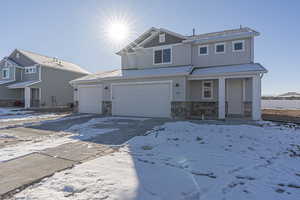 View of front of house with a garage