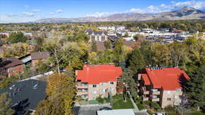 Birds eye view of property with a mountain view