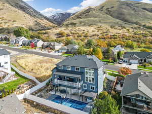 Birds eye view of property with a mountain view