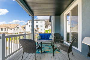 Wooden deck with an outdoor living space