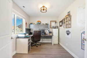 Home office with light LVP floors