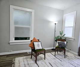 Living area featuring wood-type flooring