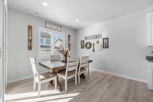 Dining area featuring light hardwood / wood-style flooring