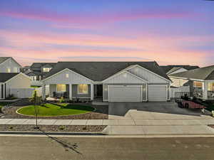 View of front of property with a garage