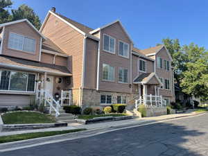 View of front facade featuring brick siding