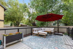 Wooden terrace with an outdoor living space