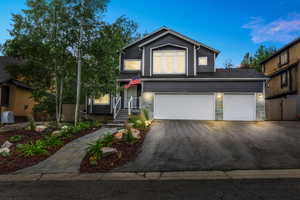 View of front of home featuring a garage