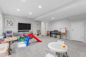 Playroom with light carpet