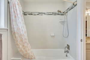 Main Bathroom featuring shower / tub combo