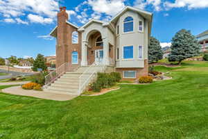 View of front of home with a front lawn