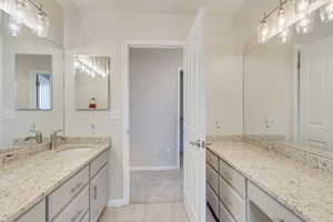 Main bathroom with extra granite countertop on the side, double sink