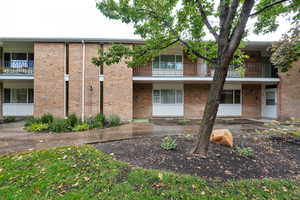 View of property featuring a balcony