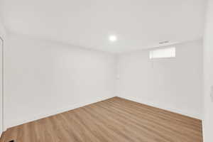 Empty room featuring light hardwood / wood-style floors