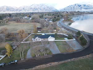 Aerial view featuring a water and mountain view