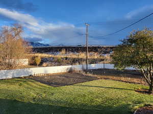 View of yard featuring a mountain view