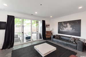 Living room featuring concrete floors