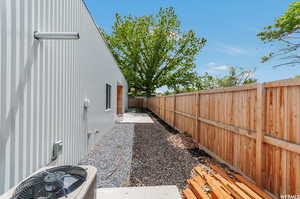 View of yard featuring central AC and a patio