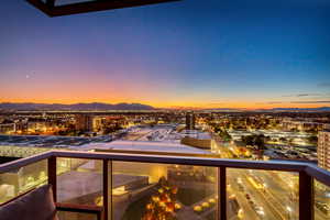 Balcony at dusk with a mountain view