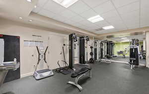 Workout area featuring a paneled ceiling