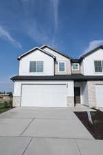 View of front of home with a garage