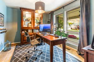 View of carpeted home office