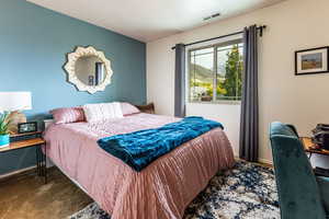 Bedroom featuring carpet flooring