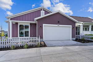 Ranch-style house featuring a garage