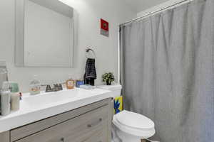 Bathroom with vanity and toilet