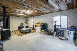 Basement featuring a wood stove