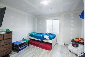 Bedroom featuring light hardwood / wood-style flooring