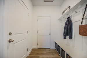 Mudroom featuring dark hardwood / wood-style flooring