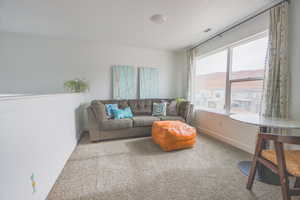 Living room with a mountain view and carpet