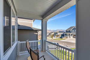 Balcony with a mountain view and a porch