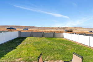 View of yard with a mountain view