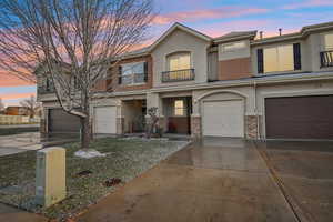 View of property featuring a garage