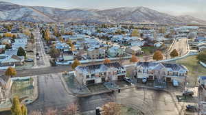 Birds eye view of property with a mountain view