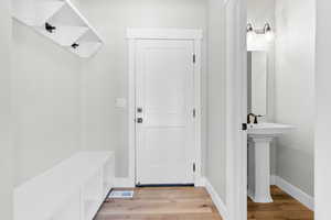 Mudroom featuring light hardwood / wood-style flooring