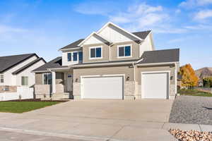 Craftsman-style home with a garage